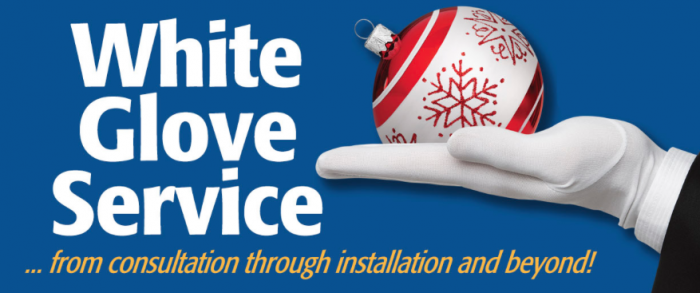 Person has white gloves and an ornament. White glove service from consultation through installations