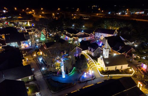Birds eye view of town with outdoor christmas lights
